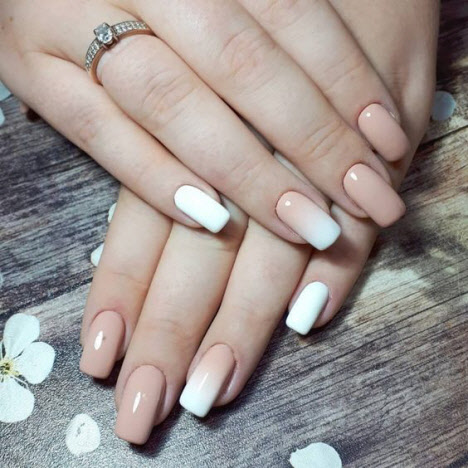 Beige manicure with white