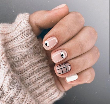Beige manicure with white