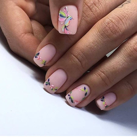 Pink manicure with a pattern